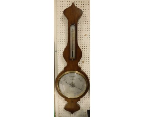 A mahogany cased banjo barometer with alcohol thermometer, the silver dial inscribed "Turton Kidderminster"