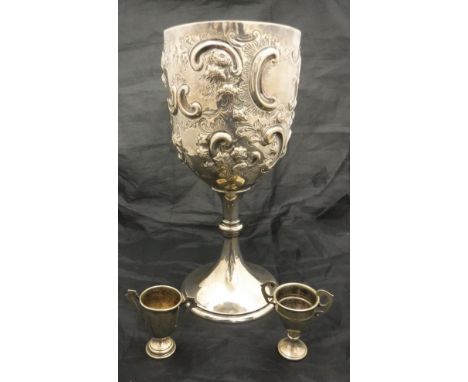 A late 19th Century silver and embossed goblet of large proportions with scroll decoration (Walter & John Barnard 1894 London