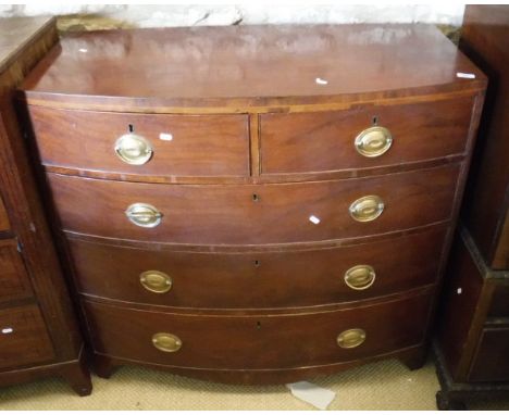 A 19th Century mahogany bow fronted chest of two short over three long graduated drawers on bracket feet
