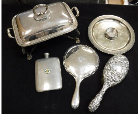 A silver backed and embossed dressing table brush and a silver backed dressing table mirror, a steel hip flask, a heated elec