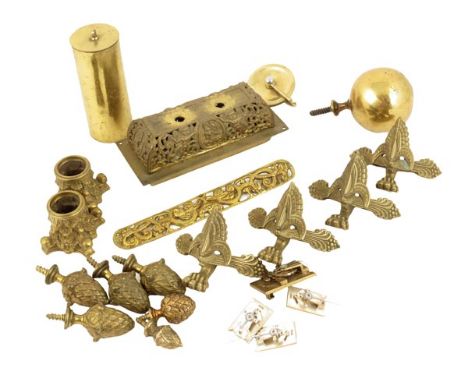 Various brass castings, to include: finials, feet, Corinthian capitals, a small basket top, carriage clock platforms, etc. (Q