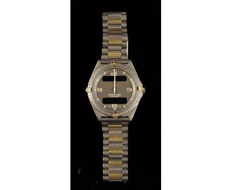 Breitling. A titanium quartz navitimer wristwatch, the signed grey dial with analogue display with two LED apertures, the bez