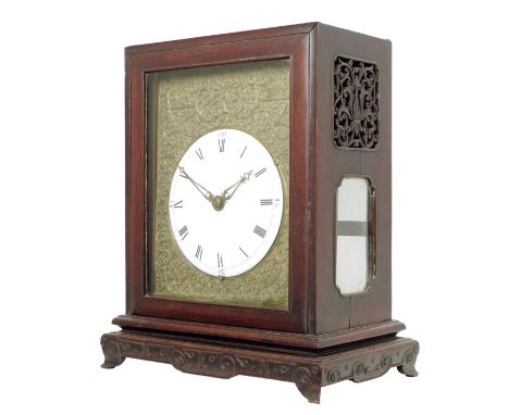 A Chinese hardwood quarter striking verge bracket clock, circular 6.5 inch white enamel dial with Roman numerals, the brass m