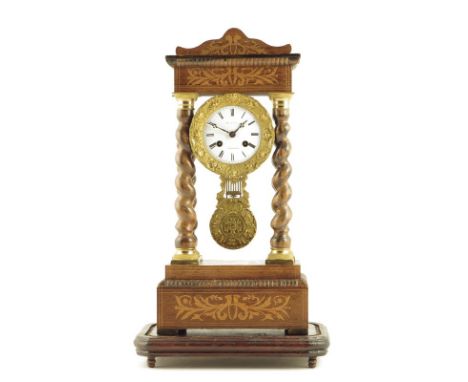 λ A French portico clock, white enamel dial with faded signature a Fontainebleu, striking drum movement by S. Marti, supporte