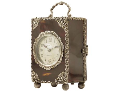 λ A silver mounted tortoiseshell carriage clock, circular silvered dial signed Tiffany & Co, New York, repeating movement num
