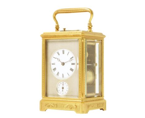 An engraved carriage clock, circular white enamel dial with subsidiary alarm dial against a guilloche silvered mask, the repe