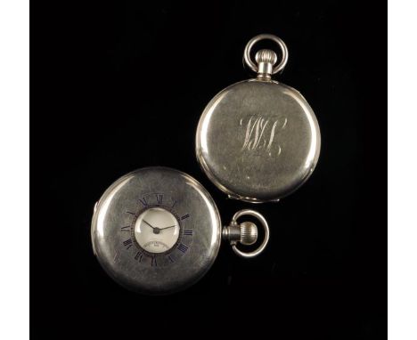 A silver hunting cased keyless lever watch, the white enamel dial and Swiss gilt movement signed J.W. Benson, London, in a pl