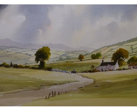 R WITCHARD watercolour - expansive landscape with farmstead and figure with a cart on a track, signed, 36 x 53cms