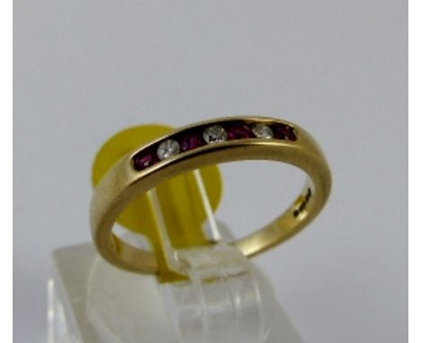 9ct gold ruby and diamond seven stone ring, size L