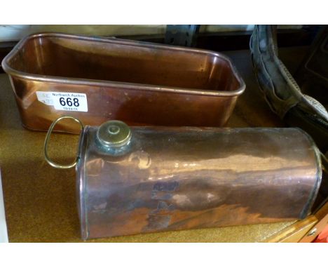 Copper planter and antique copper carriage foot warmer