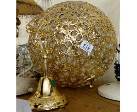Spherical yellow coloured ceiling light