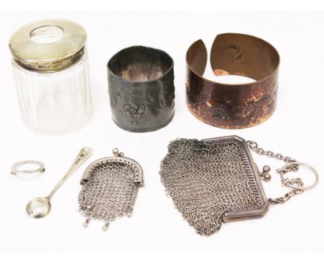 A mixed lot comprising two purses, a pewter napkin ring, a copper bangle, a silver brooch, a silver spoon and a silver topped