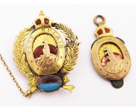 A 9ct gold enamel military badge, length 3.2cm and another. Gross wt. 7.5g