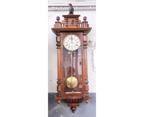 A Gustav Becker Vienna wall clock. L130cm