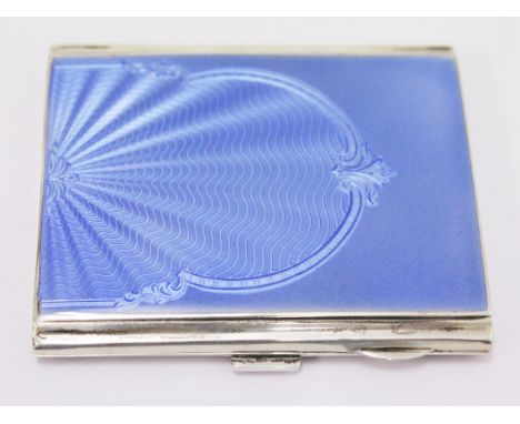 A hallmarked silver and blue enamel cigarette case with gilt interior. 7cm x 8.5cm. Condition - very good, no damage, minor m