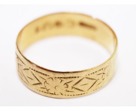 An 18ct gold ring. Wt. 3.3g. Size R