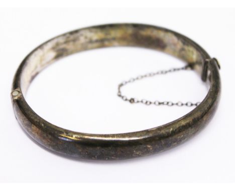 A hallmarked silver bangle. Diam. 6cm