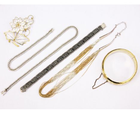A mixed lot of jewellery comprising a silver brooch, a silver chain, a silver bracelet and a rolled gold bangle