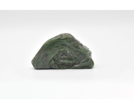 Finely carved with a pagoda beside a river gorge within a mountainous landscape scene, pine trees issuing from clouds and roc