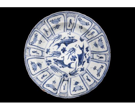 Painted in the Yuan style with three central carp within a panelled floral border   Diameter: 36cm   Provenance: Sworders, Es