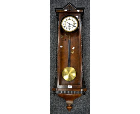 A 19th century walnut Vienna three-weight wall clock, the 17.5cm white enamelled dial with Roman numerals, three winding hole