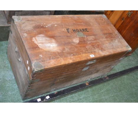 A camphor wood campaign style trunk