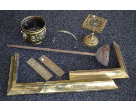 Metalware - a Fender;  brass trivet;  a planter, posser etc 