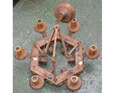 A Spanish six light iron chandelier