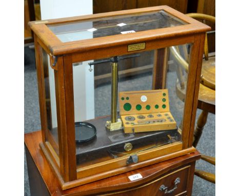 A set of Griffin and Tatlock scientific scales, cased