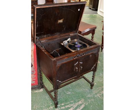 An oak cased Excelsior gramophone.