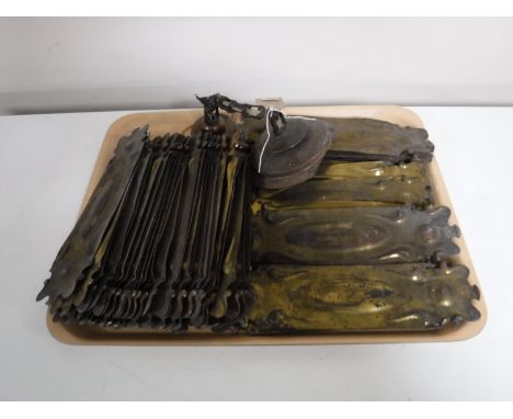 A tray consisting of approximately forty brass finger plates, together with a copper light fitting pendant 