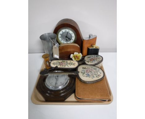 A tray containing an early twentieth century mahogany mantel clock, oak barometer, cased manicure set, hip flask, egg timer, 