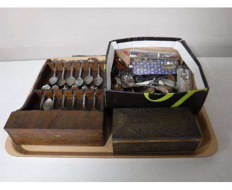 A tray of crested tea spoons, baby spoon, caddy spoon etc 