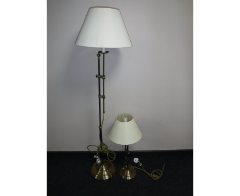 A contemporary floor lamp with shade and matching table lamp 