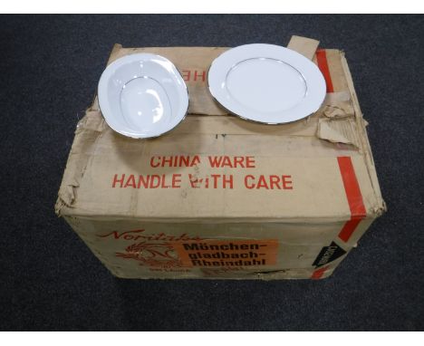 A boxed Noritake dinner service 