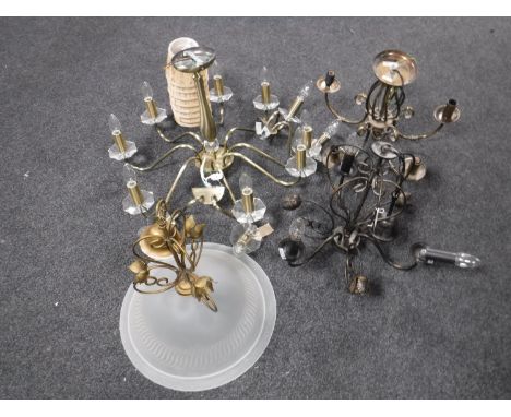 A contemporary brass eight-way light fitting together with a pair of matching wall lights and Three contemporary light fittin