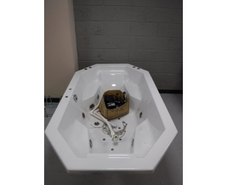 A two person spa bathtub (LED light), together with pump and fittings 