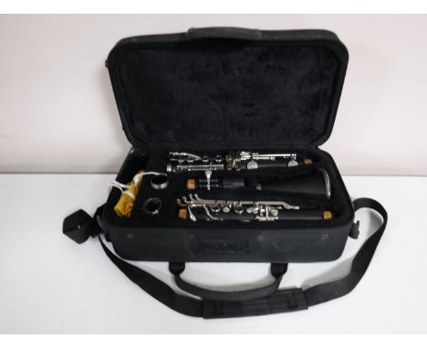 A four piece clarinet in case 