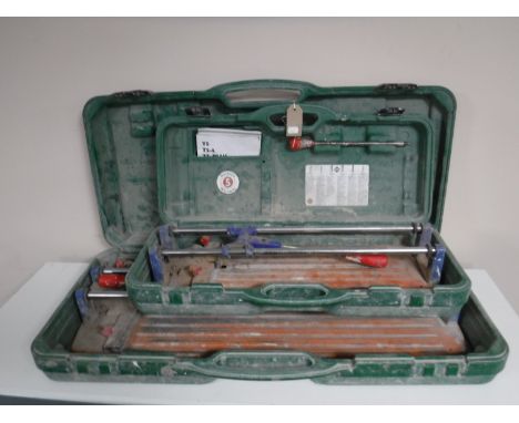 Two cased Rubi tile cutters