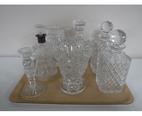 A tray of 20th century glass ware including four decanters with stoppers (including one with silver collar), two glass vases 