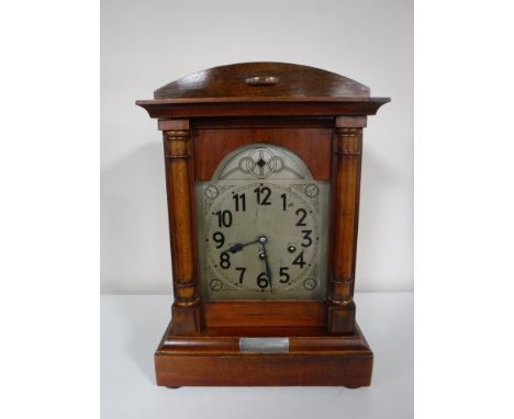 A Junghans presentation striking bracket clock, movement dated 1919, with pendulum and key 