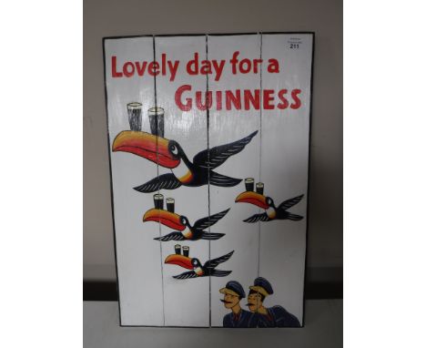 An advertising painting on panel - Lovely day for a Guinness