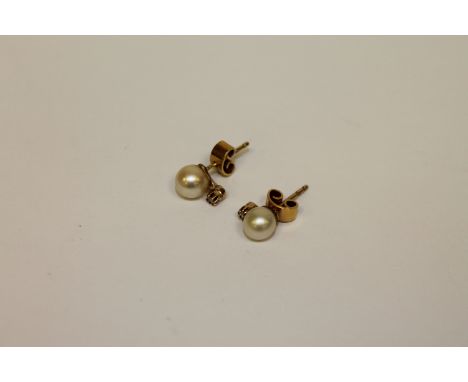 A pair of 14ct gold pearl and diamond earrings