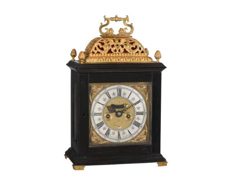 Y A WILLIAM III GILT BRASS MOUNTED EBONY 'BASKET-TOP' TABLE CLOCKJOHN MONCREIFT, LONDON, CIRCA 1695The six finned pilar twin 