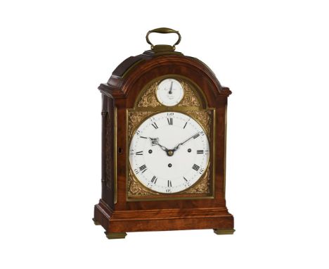 A FINE BRASS MOUNTED MAHOGANY QUARTER-CHIMING TABLE CLOCK WITH FIRED ENAMEL DIAL INSERTSMATTHEW DUTTON, LONDON, CIRCA 1800The