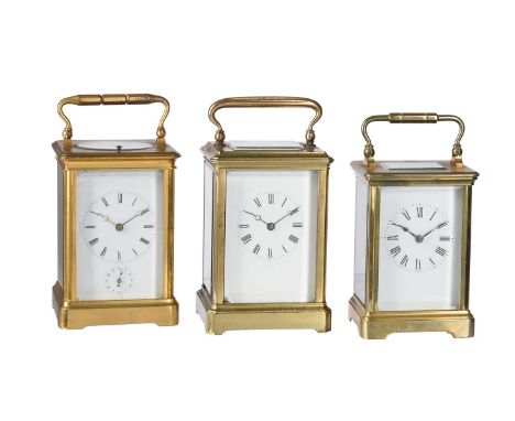 TWO FRENCH BRASS CARRIAGE CLOCKS AND A TIMEPIECEINCLUDING AN EXAMPLE BY DROCOURT, PARIS, LATE 19th CENTURYThe first a gilt al