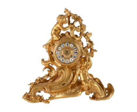 A FRENCH LOUIS XV STYLE GILT BRASS MANTEL CLOCKUNSIGNED, LATE 19th CENTURYThe eight-day bell striking movement with anchor es