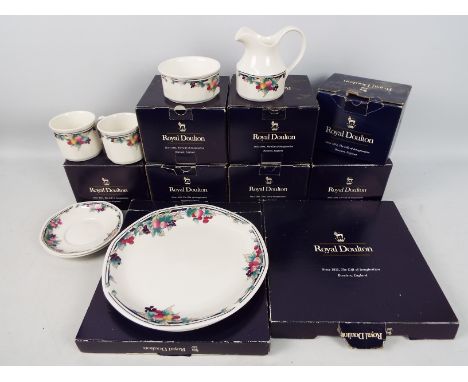 Royal Doulton - A collection of boxed Autumns Glory pattern dinner and tea wares comprising six sets of two teacups and sauce