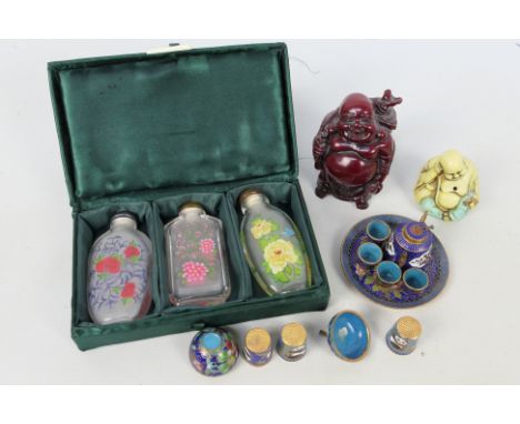 A small group of Chinese items to include miniature cloisonne tea set, resin model of Budai, further cloisonne and similar.