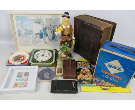 Lot to include a Victorian family bible, camera, ceramic wall clock, playing cards and similar.